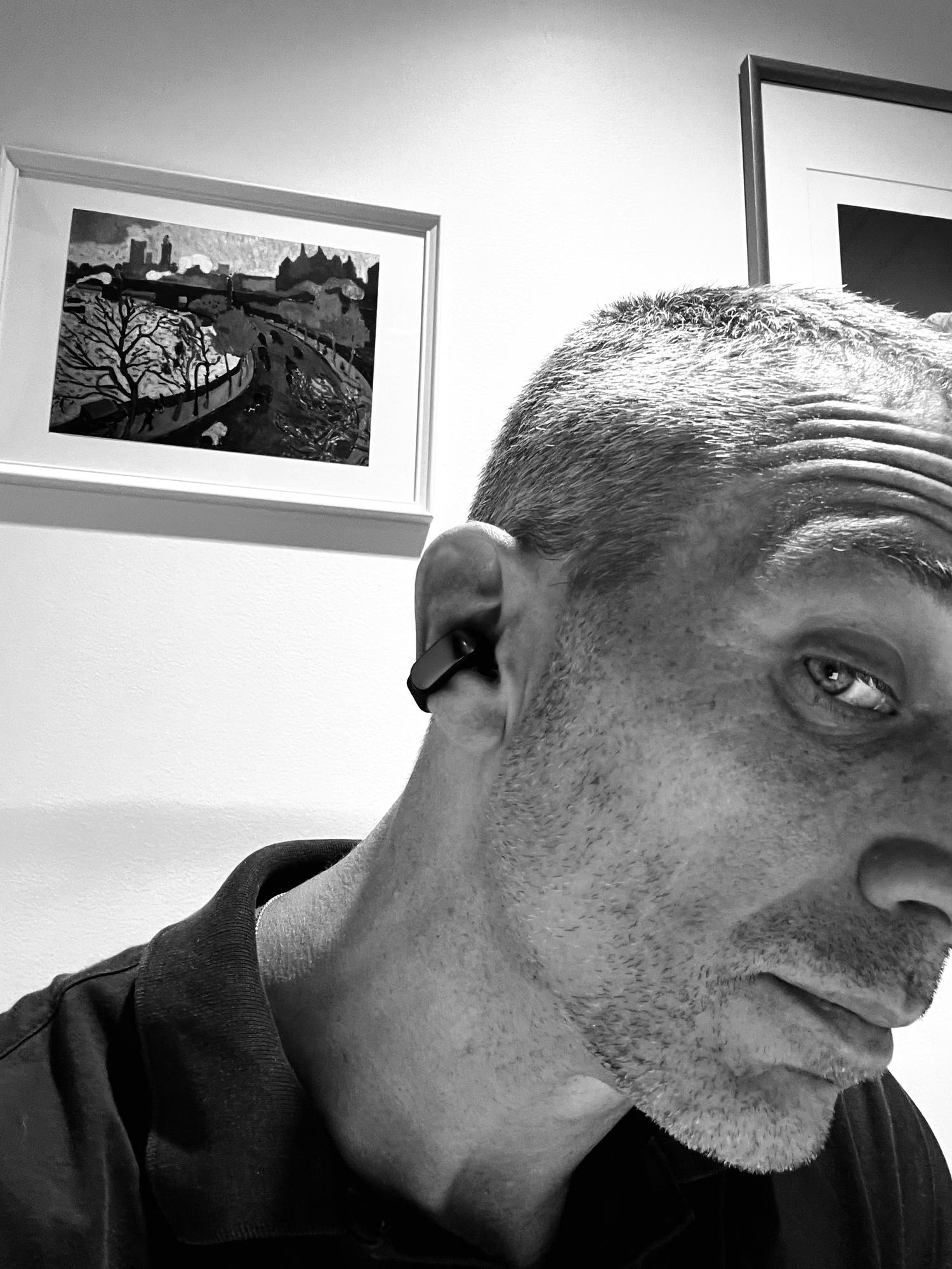 Todd Reily wearing a Bose Ultra Open Earbud